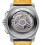 Close-up of the Breitling Super Avenger B01 Chronograph 46 back, highlighting its exposed automatic movement, engraved case details, and a yellow and blue aviation-inspired leather strap.