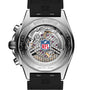 Close-up of the Breitling Chronomat B01 42 NFL Seattle Seahawks Edition watch back, showing visible gears, the NFL logo, and engraved text on the surrounding metal.