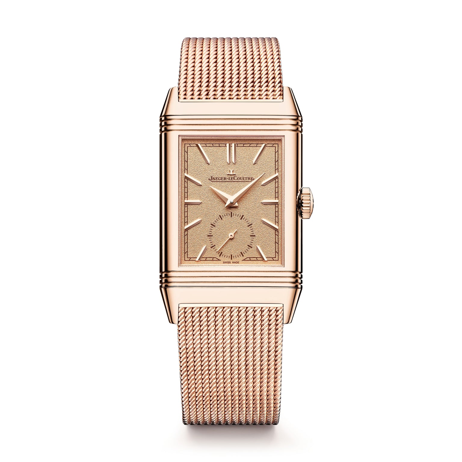 The Jaeger-LeCoultre Reverso Tribute Monoface Small Seconds is a rectangular rose gold wristwatch with a mesh band, golden grained dial, minimalist display, and small seconds subdial, shown against a white background.