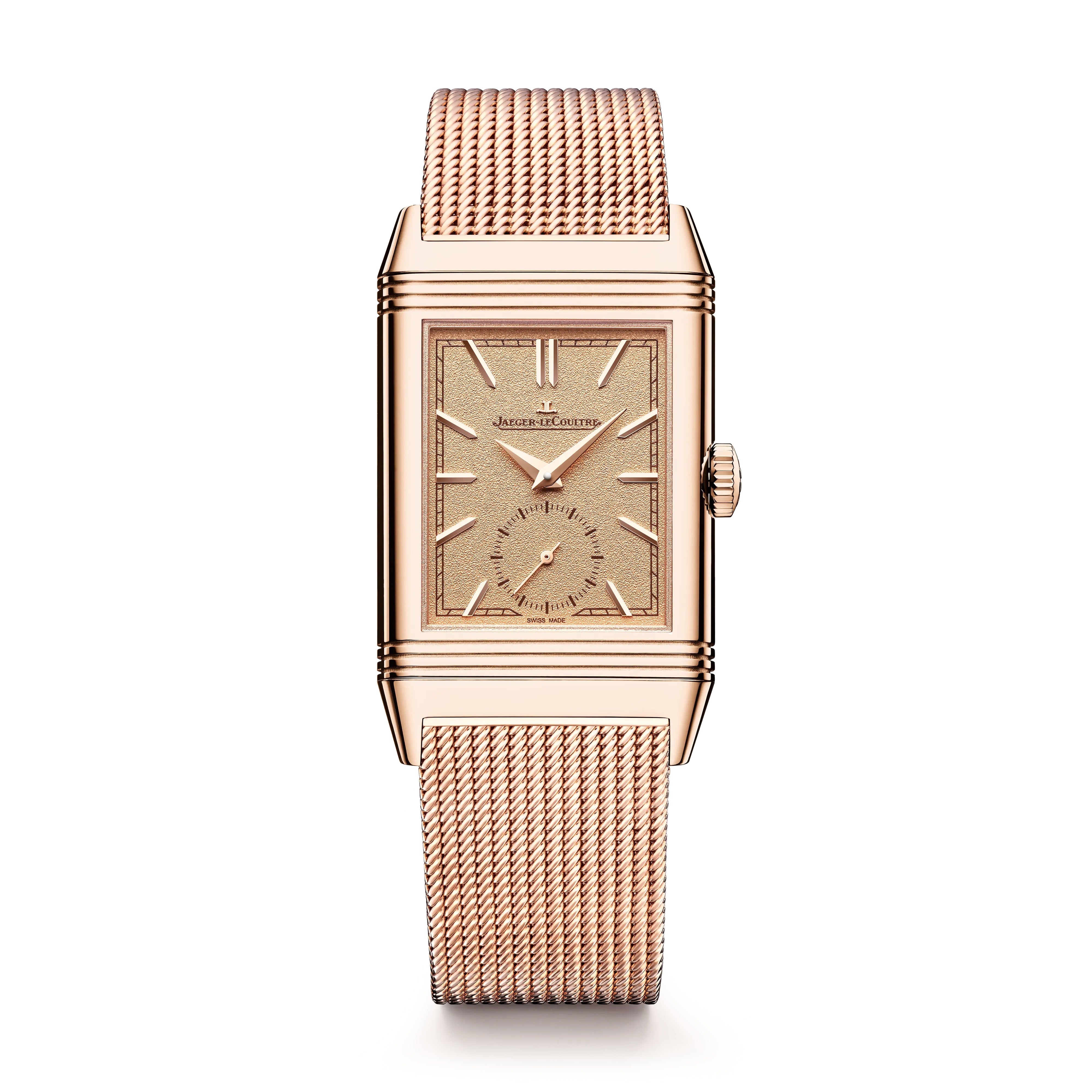 The Jaeger-LeCoultre Reverso Tribute Monoface Small Seconds is a rectangular rose gold wristwatch with a mesh band, golden grained dial, minimalist display, and small seconds subdial, shown against a white background.