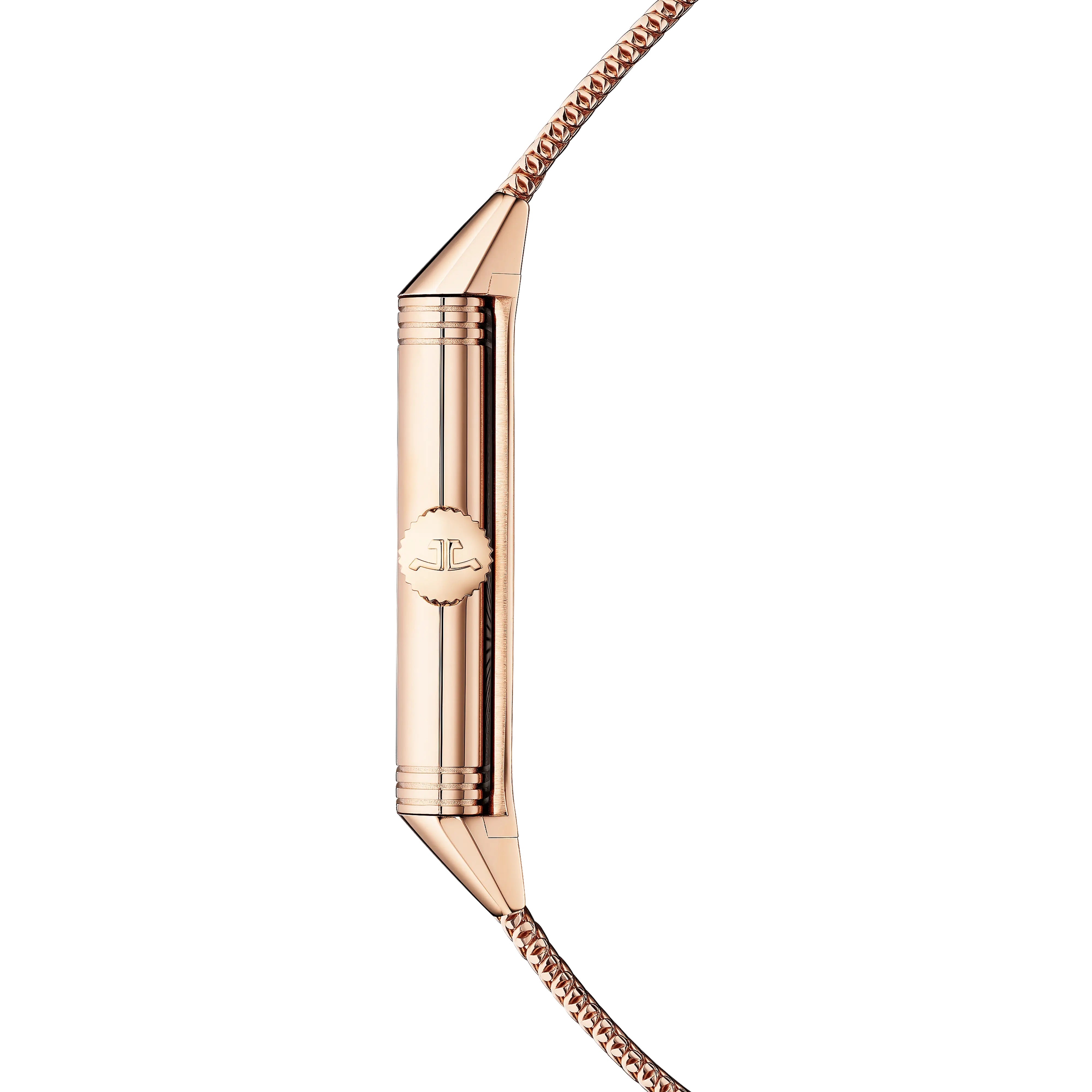 Side view of a slim, rectangular Jaeger-LeCoultre Reverso Tribute Monoface Small Seconds case with engraved logo and matching bracelet, showcasing its golden grained dial against a white background.