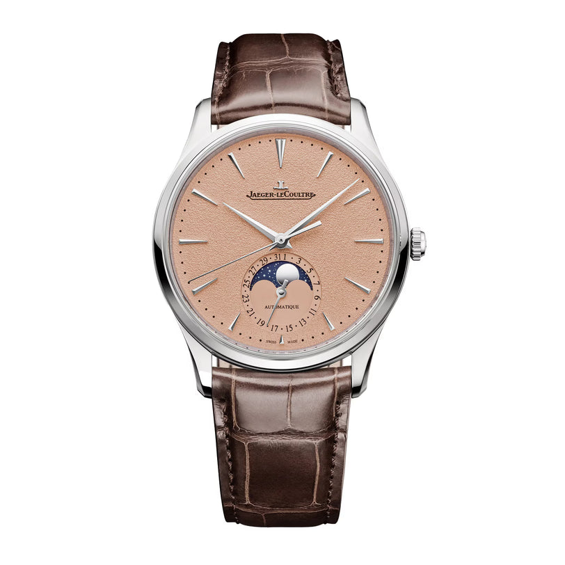 The Jaeger-LeCoultre Master Ultra Thin Moon features a textured beige dial, silver hands and markers, moon phase at 6 o’clock, stainless steel case, calibre 925 movement, and a brown alligator leather strap.