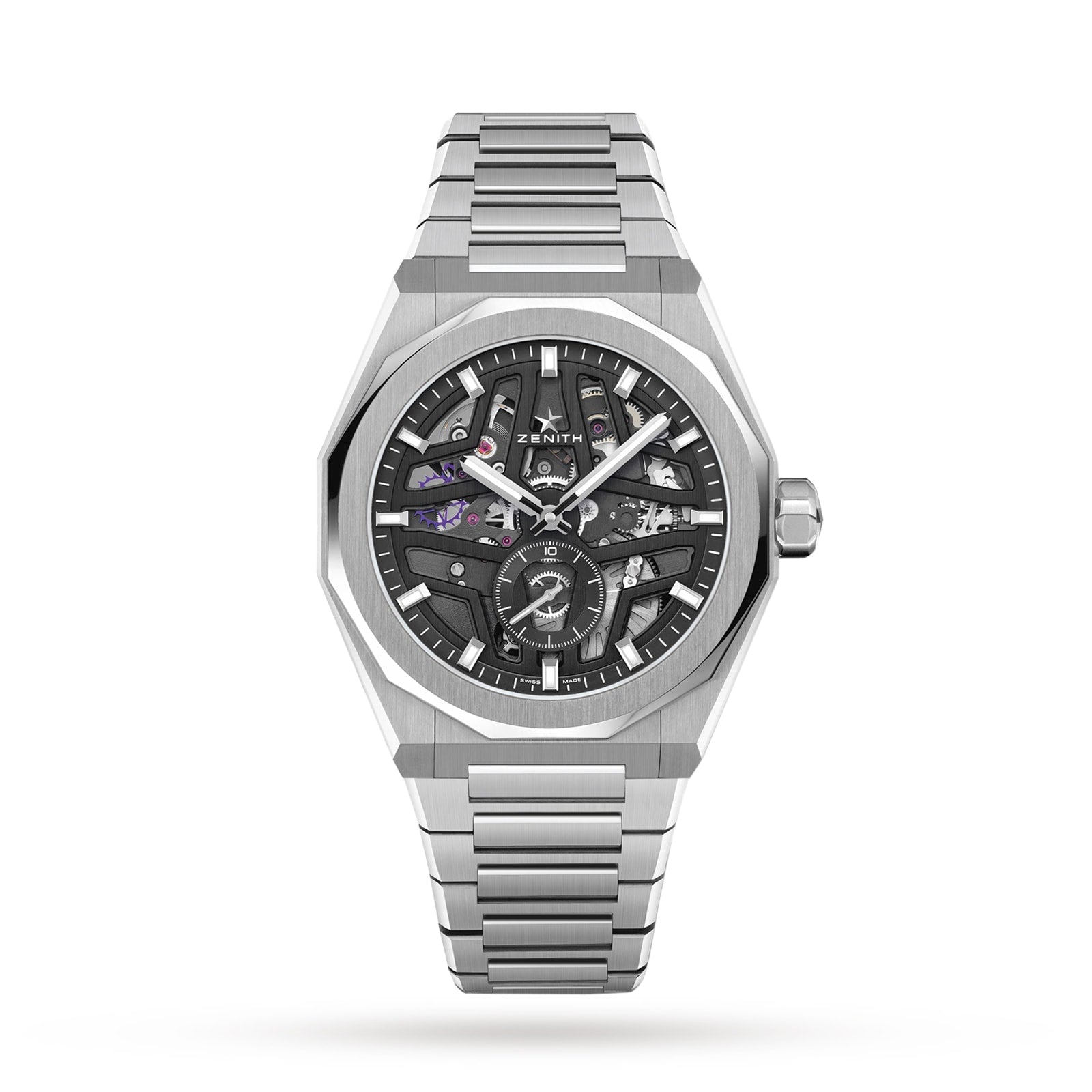 A Zenith Defy Skyline Skeleton watch in silver stainless steel with a skeleton dial, featuring luminous hands and a metal link bracelet, is photographed on a white background.
