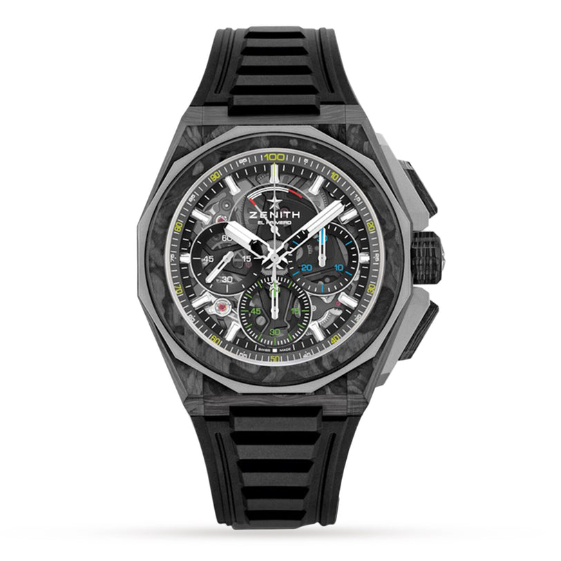 The Zenith Defy Extreme Carbon is a black chronograph watch featuring a skeleton dial, green accents, and a black rubber strap.