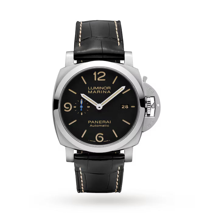 The Panerai Luminor Marina features Italian design, a black dial with tan numerals, a black leather strap, small seconds at 9 o’clock, date at 3 o’clock, and a stainless steel case with crown guard.