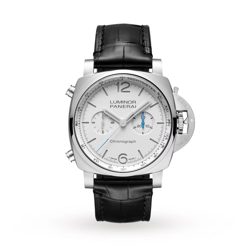 The Panerai Luminor Chrono is a silver luxury dive watch with a white dial, black leather strap, silver hour markers, three subdials, blue detailing, and a signature crown guard on the right side.