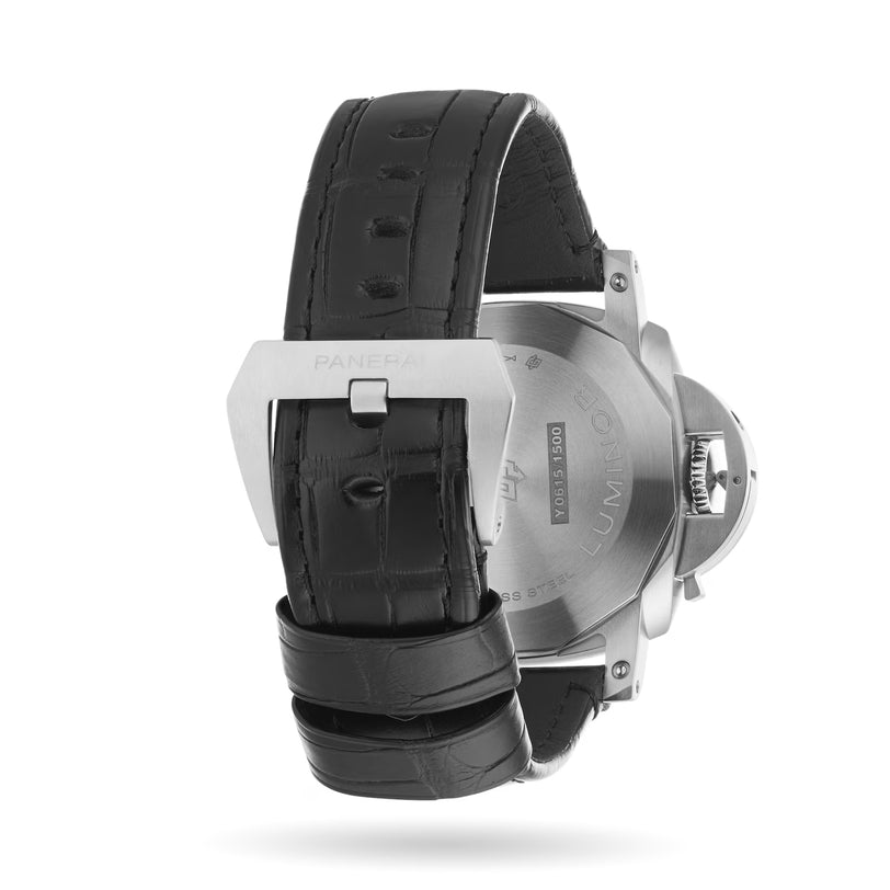 A close-up of the Panerai Luminor Chrono dive watch highlights its engraved metal case back, black leather strap with detailed stitching, and a silver buckle.