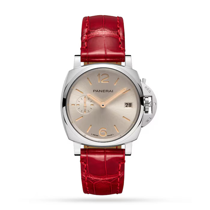 The Panerai Luminor Due is a luxury wristwatch with Italian design, silver dial, gold hour markers, date display, and small seconds subdial. Its polished metal case pairs elegantly with a shiny red crocodile leather strap.
