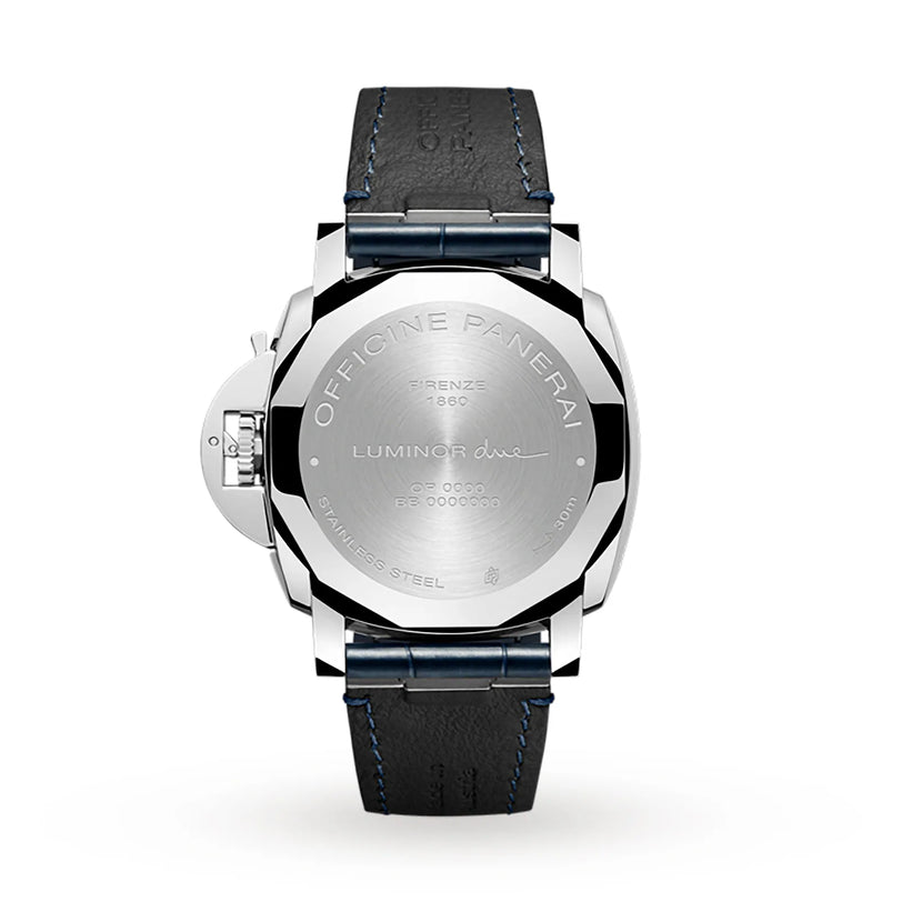 A Panerai Luminor Due in stainless steel, viewed from the back, highlights Italian design with intricate engravings and a black leather strap with blue stitching. The caseback shows branding and serial details.
