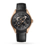 The Ulysse Nardin Freak X Rose Gold watch features a black leather strap, black dial, rose gold case, and visible gears—exemplifying the distinctive craftsmanship of the Freak X collection.