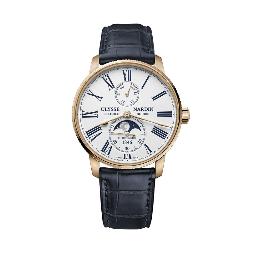 The Ulysse Nardin Marine Torpilleur Moonphase features a gold case, white dial, blue Roman numerals, subdials, and a black leather strap.