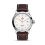 The TUDOR 1926 features a white textured dial, gold hour markers, date at 3 o’clock, and a brown leather strap—a classic, elegant wristwatch ideal for enthusiasts of refined mechanical timepieces.