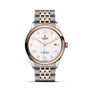 The TUDOR 1926 wristwatch features a silver and rose gold bracelet with a white date dial.