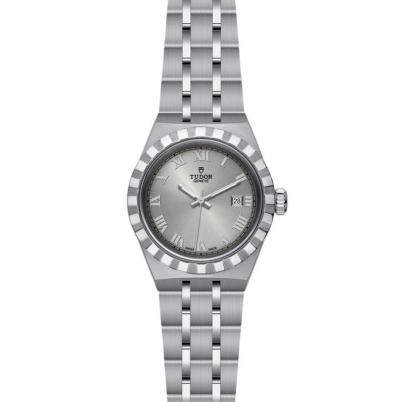 The TUDOR Royal is a stainless steel wristwatch featuring a silver dial, Roman numerals, date at 3 o’clock, and a classic link bracelet—an icon of sport-chic style.