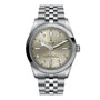 The TUDOR Black Bay One 36 is a stainless steel wristwatch with a champagne dial, diamond hour markers, date at 3 o’clock, and a durable 316L steel bracelet inspired by Black Bay designs.