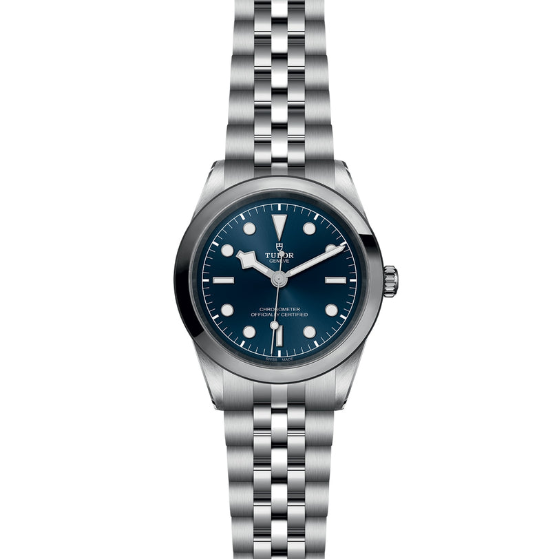 A TUDOR Black Bay One 41 stainless steel wristwatch with a blue dial and silver bracelet, shown from the front.