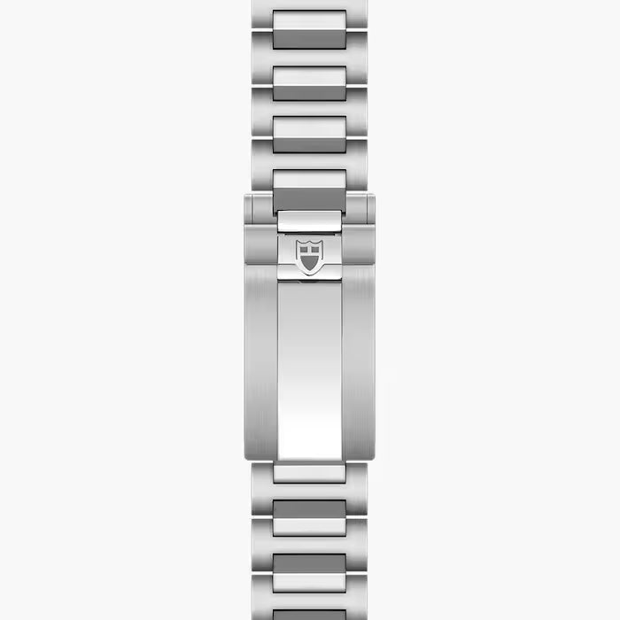 Silver-tone stainless steel watch bracelet with rectangular links and shield logo clasp.