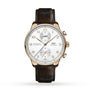 An IWC Schaffhausen Portugieser Chronograph with a gold case, white dial, gold markers and hands, brown leather strap, and three subdials is displayed against a plain white background.