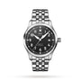 The IWC Schaffhausen Pilots Watch Mark XX features a stainless steel case, black dial with white numerals, date display, and a silver metal link bracelet, exemplifying classic tool watch design on a white background.