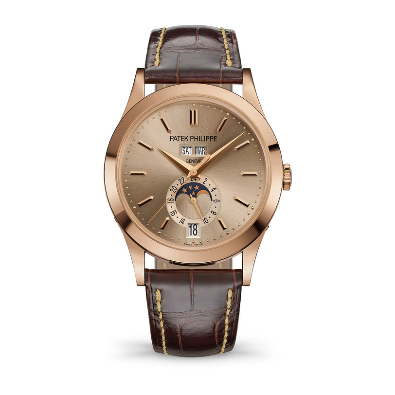 Patek Philippe watch with brown leather strap on a white background