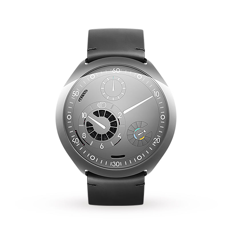 The Ressence TYPE 2 Grey is a modern silver wristwatch featuring a black leather strap and multiple dials on its face.