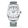 The Grand Seiko Spring Drive 5 Days Evolution 9 is a stainless steel wristwatch with a silver textured dial inspired by Japanese nature, blue second hand, Spring Drive movement, date at 3 o’clock, and a metal bracelet band.