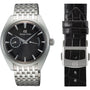 The Grand Seiko Manual Elegance wristwatch features a black textured dial, metal bracelet, and Zaratsu craftsmanship, displayed beside a black leather strap with a metal GS-engraved clasp.