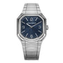 The Gerald Charles Masterlink Blue is a luxury wristwatch featuring a blue textured dial, silver hour markers, and a metal bracelet strap.