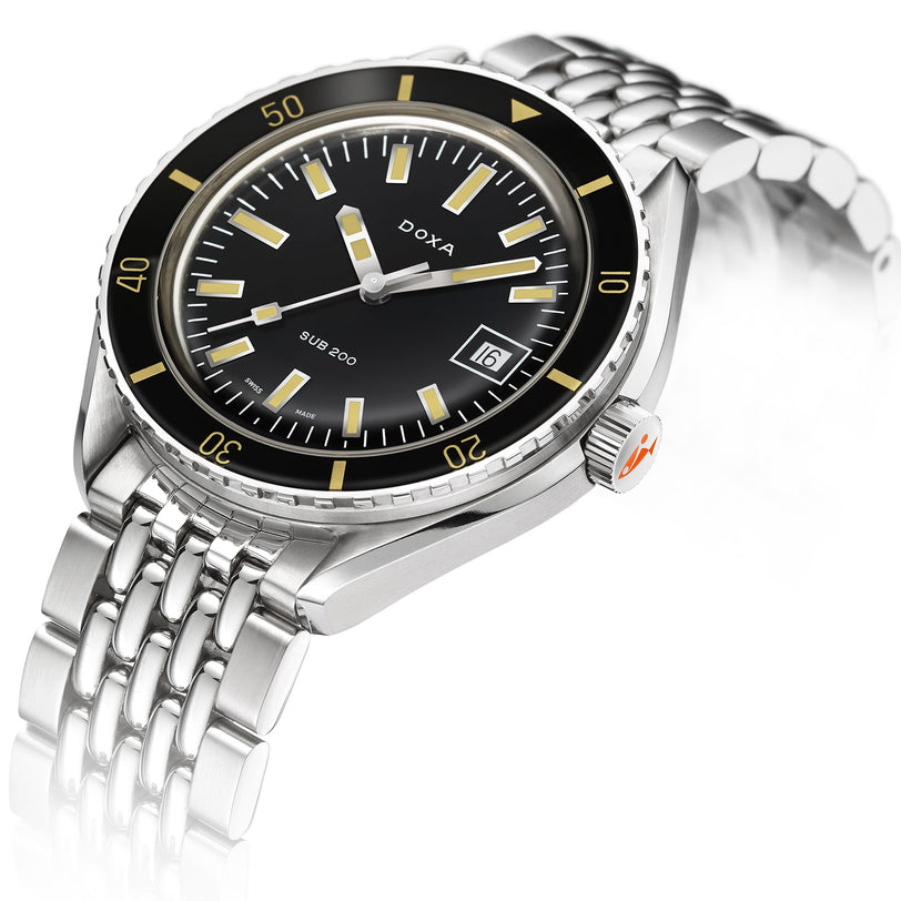 The DOXA Sub 200 Sharkhunter is a 316L stainless steel divers watch with a black unidirectional rotating bezel, black dial, luminous markers, date window at 3 o’clock, and a linked bracelet.