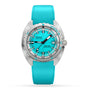 The DOXA Sub 300 Aquamarine is a dive watch featuring a turquoise round dial, date at 3 o’clock, turquoise rubber strap, and a robust 316L stainless steel case.