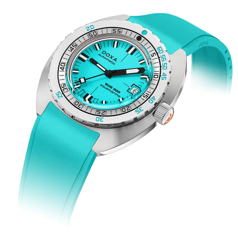 The DOXA Sub 300 Aquamarine is a divers watch with an aquamarine dial, matching rubber strap, and a durable 316L stainless steel case.