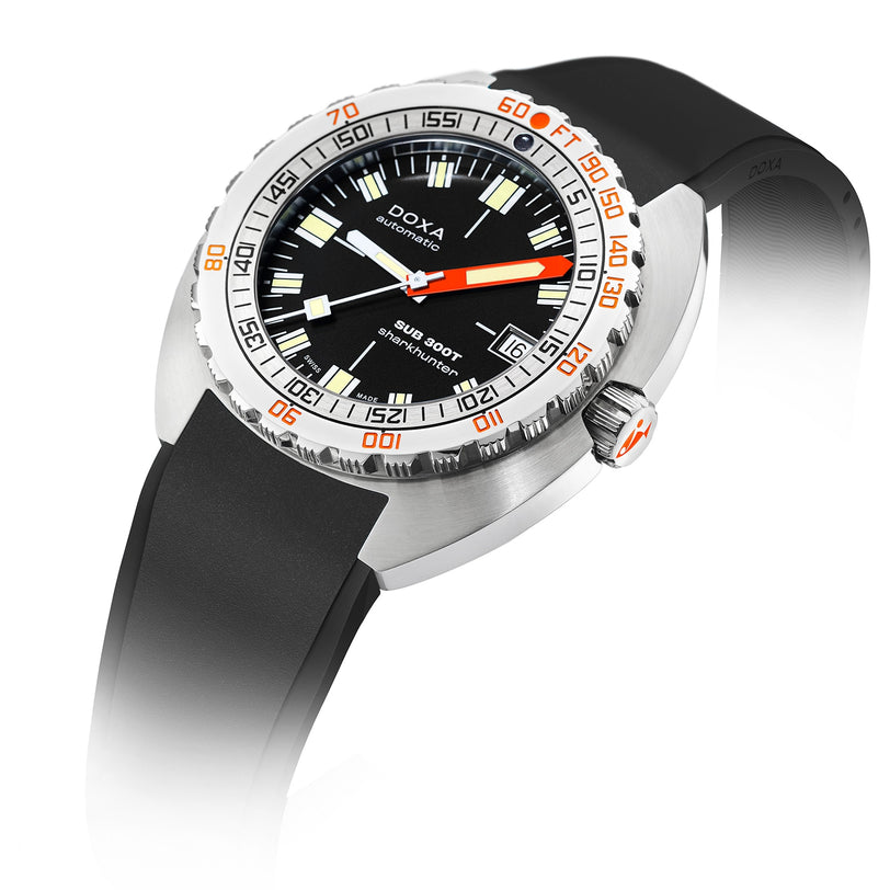 A DOXA Sub 300T Sharkhunter divers watch with a black dial, orange accents, rotating bezel, and black rubber strap is displayed against a white background.