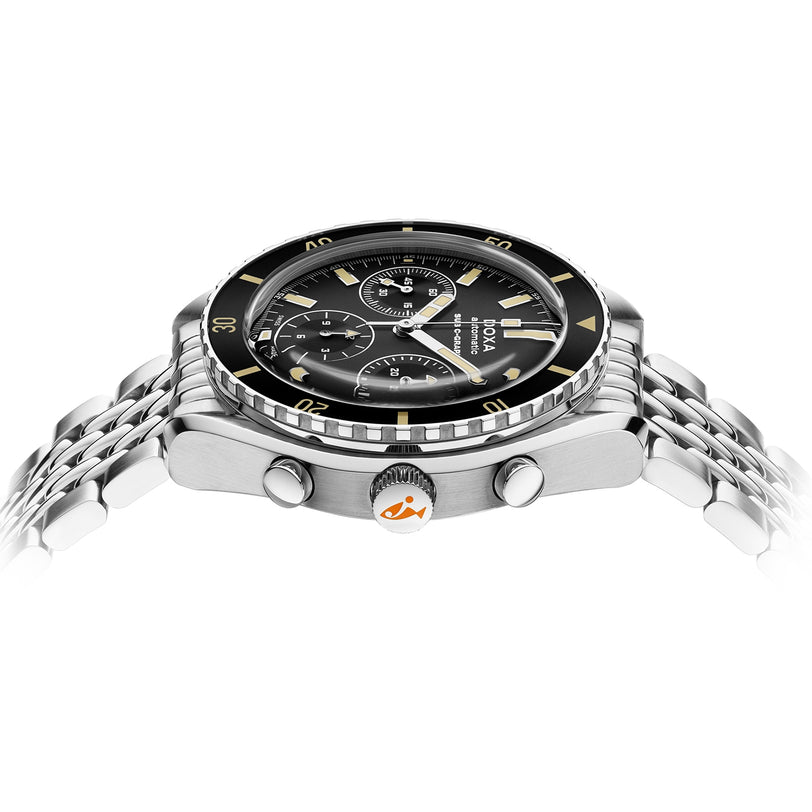 A close-up side view of the DOXA Sub 200 C-Graph Sharkhunter wristwatch featuring a stainless steel case, black and gold bezel, three chronograph subdials, and a metal link band.