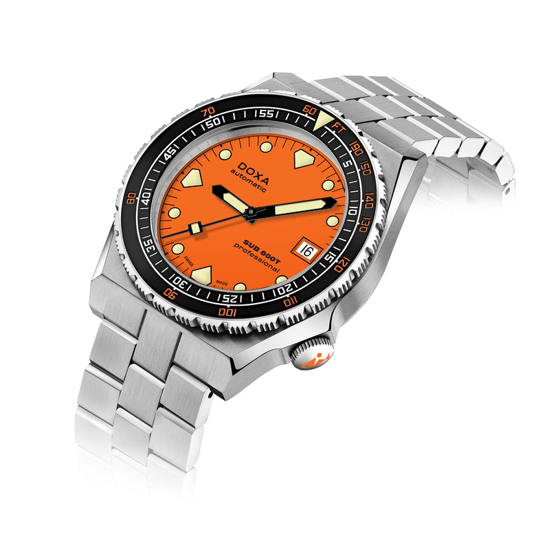 The DOXA Sub 600T Professional dive watch features a stainless steel case, vibrant orange dial, black bezel, and date window, shown on a metal bracelet against a white background.
