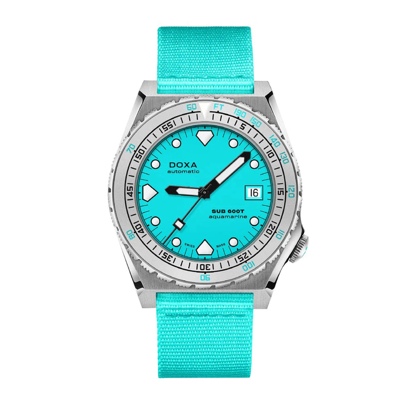 The DOXA Sub 600T Aquamarine is a stainless steel divers watch with a turquoise dial, matching fabric strap, date display, and automatic movement.