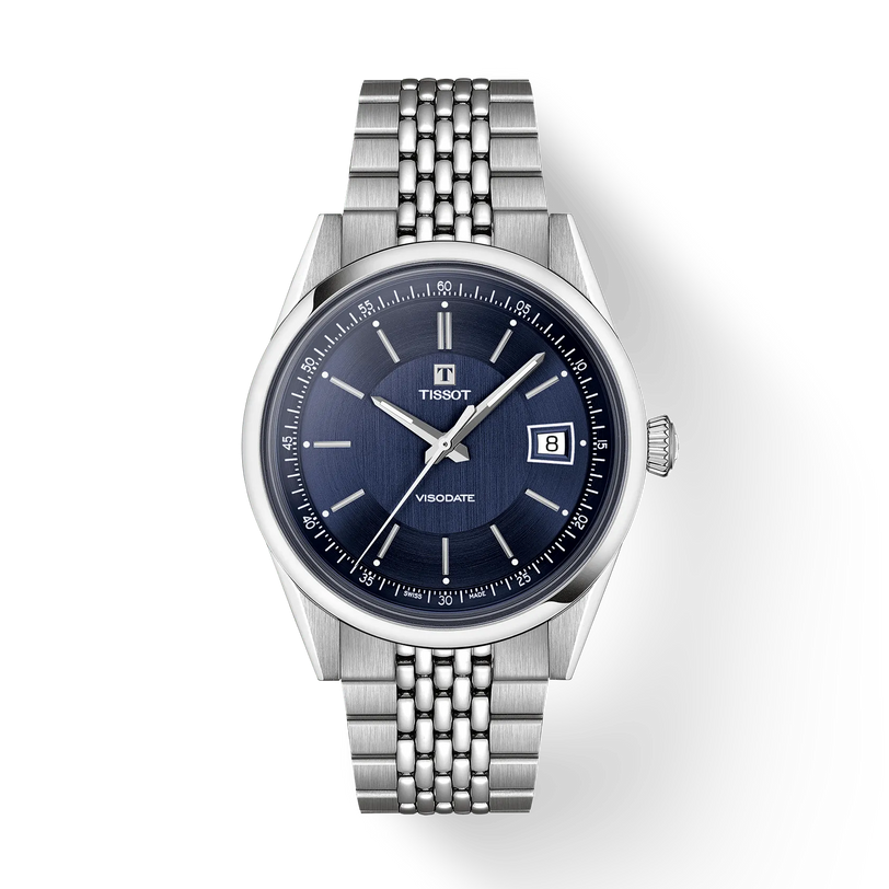 Tissot Visodate stainless steel watch with dark blue dial, date window, and matching metal bracelet.