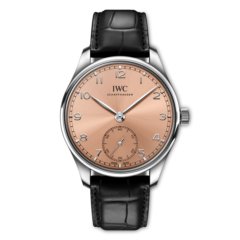 IWC watch with a black leather strap and rose gold dial on a white background