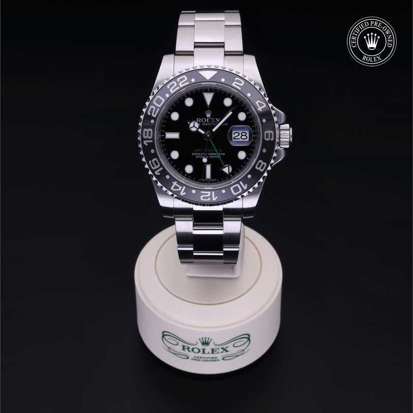 Rolex Certified Pre-owned GMT II M116710LN-0001 front on black background