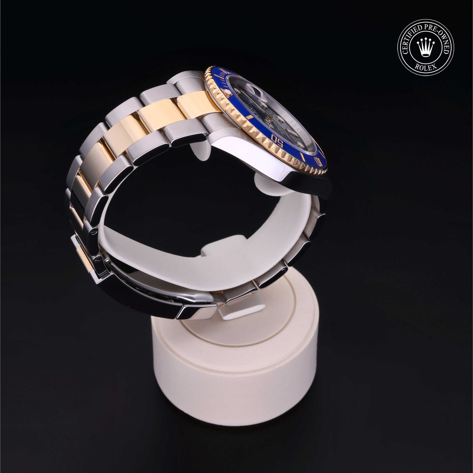 Rolex Certified Pre-owned Submariner M126613LB-0002 front on black background