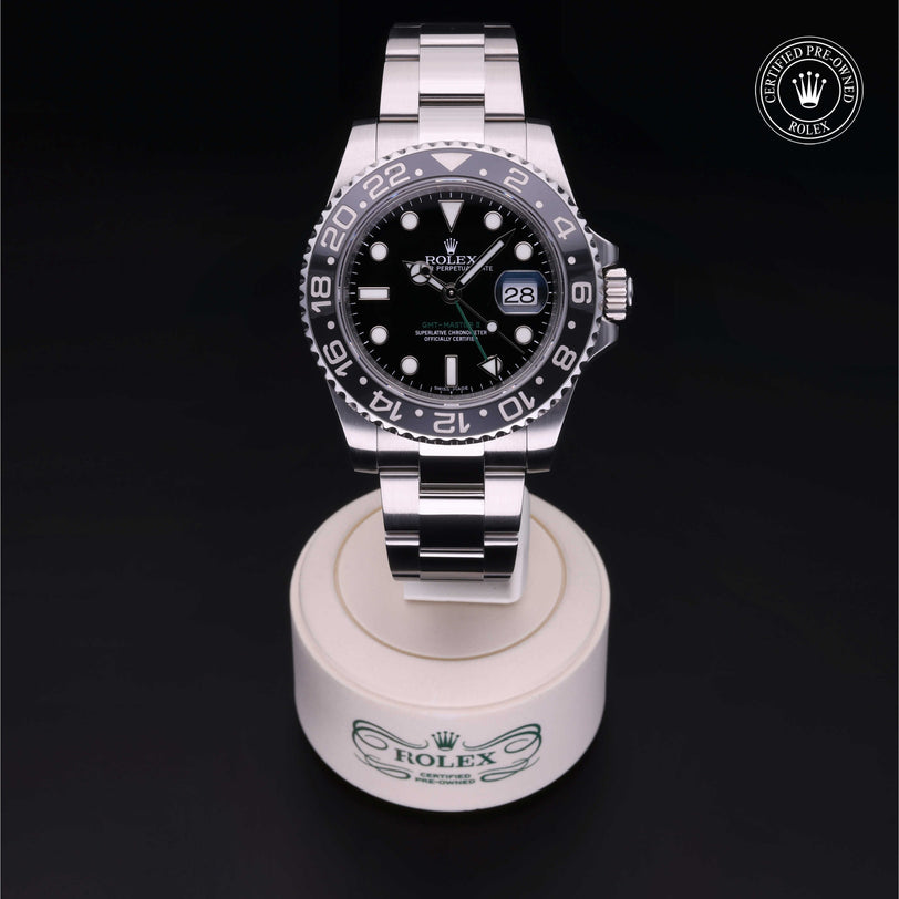 Rolex Certified Pre-owned GMT M116710LN-0001 front on black background