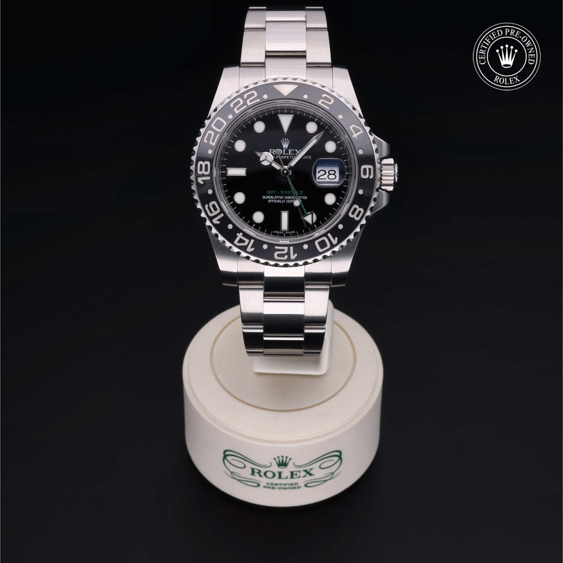 Rolex Certified Pre-owned GMT M116710LN-0001 front on black background