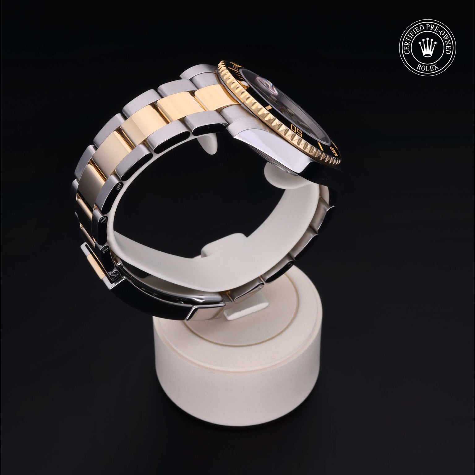 Rolex Certified Pre-owned Submariner M116613LN-0001 front on black background