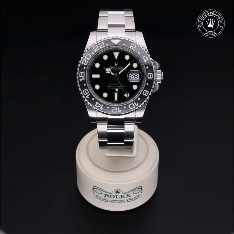 Rolex Certified Pre-owned GMT M116710LN-0001 front on black background
