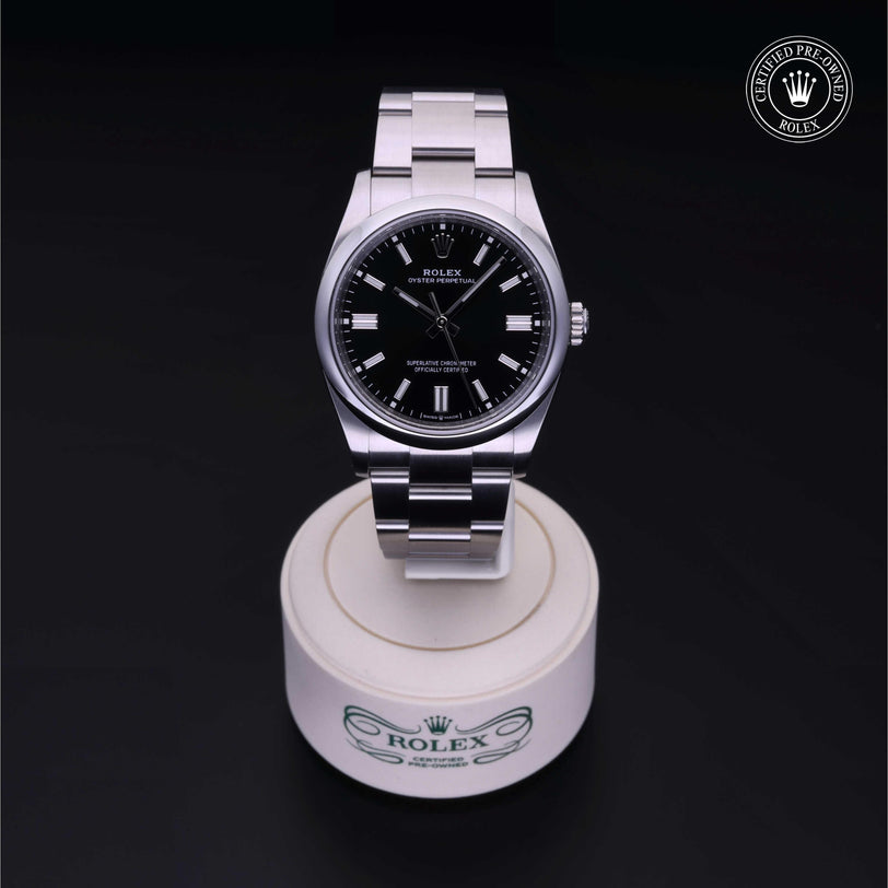 Rolex CPO Oyster Perpetual M126000 front on white background