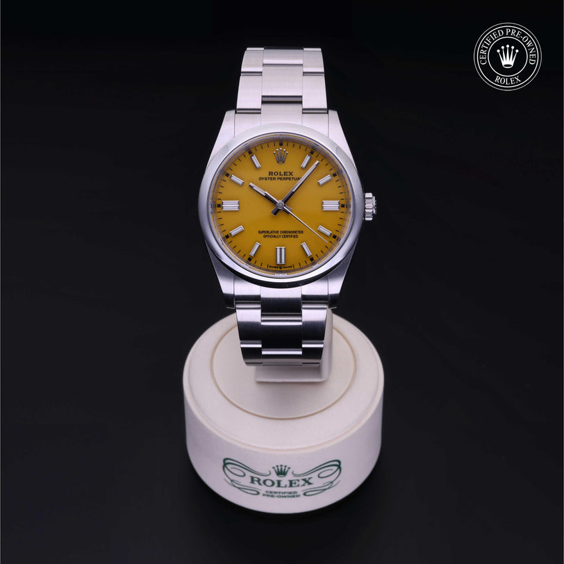 Rolex CPO Oyster Perpetual M126000 front on white background