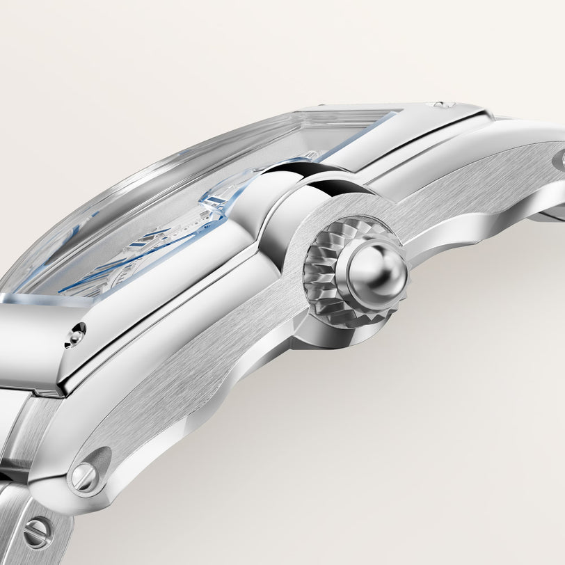 White and silver die-cast roadster model with detailed wheels, windshield, and sleek body design shown from side angle.
