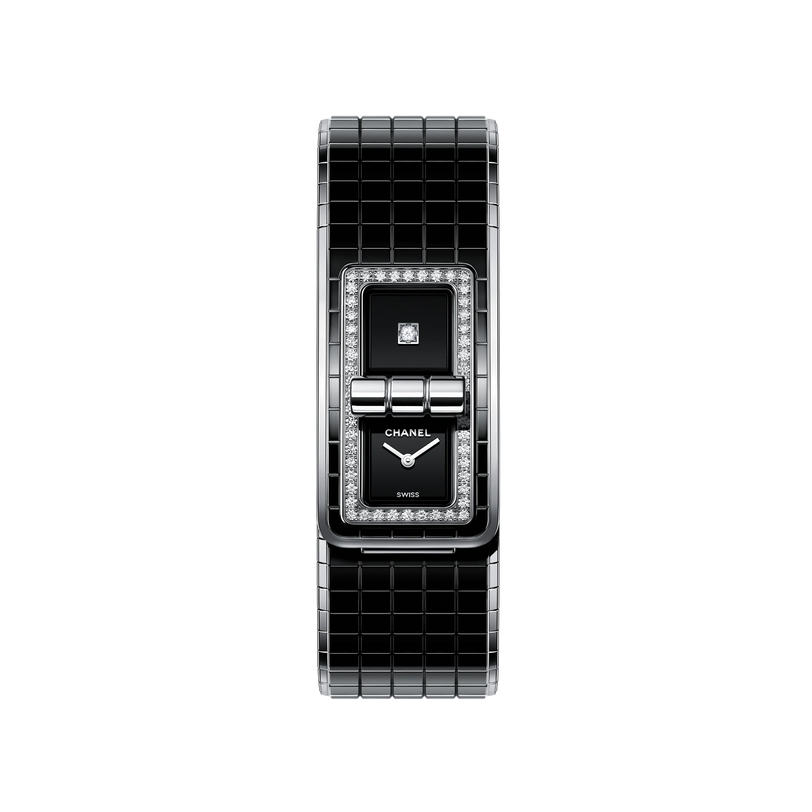 The Chanel Code Coco is a luxury wristwatch with a rectangular black ceramic design, diamond-studded bezel, double-dial black face, steel accents, and a matching black ceramic link bracelet.