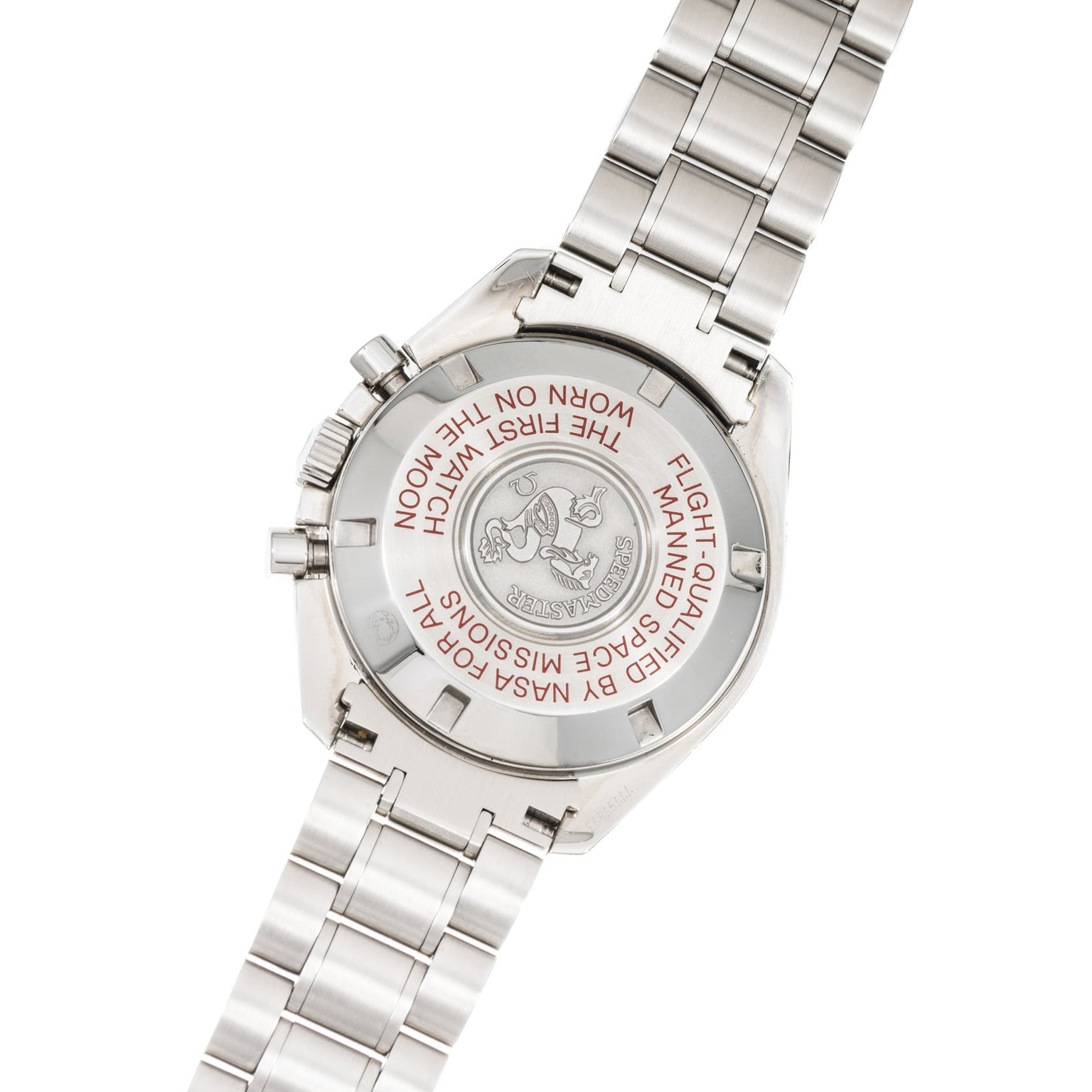 Back of an OMEGA Speedmaster Tintin stainless steel wristwatch featuring engraved text about NASA and the moon missions.