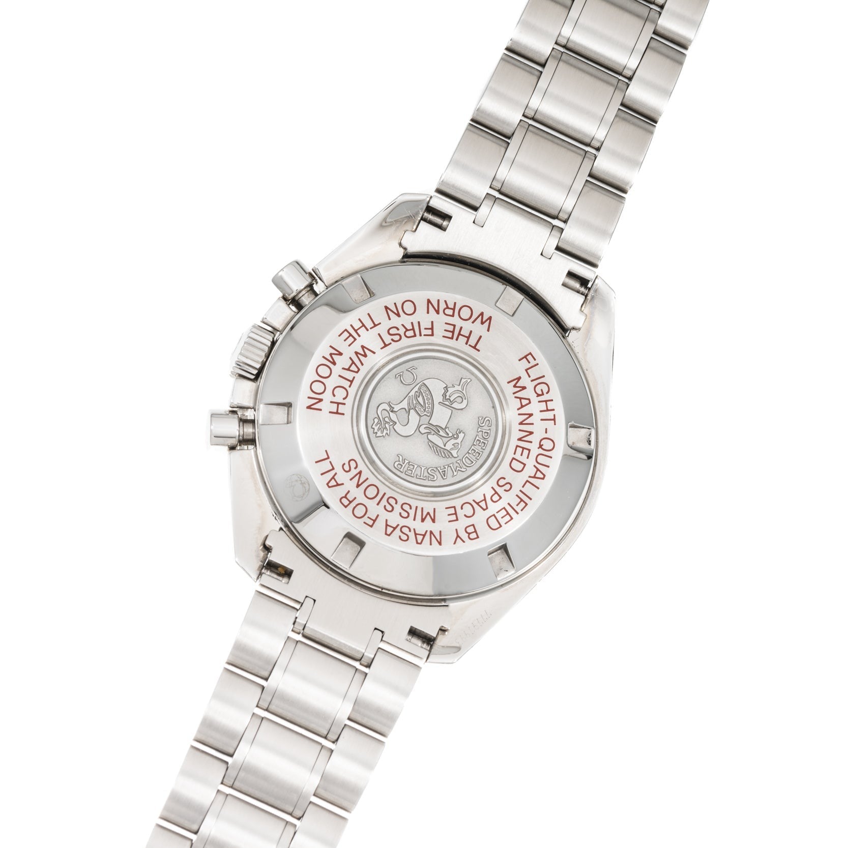Back of an OMEGA Speedmaster Tintin stainless steel wristwatch featuring engraved text about NASA and the moon missions.