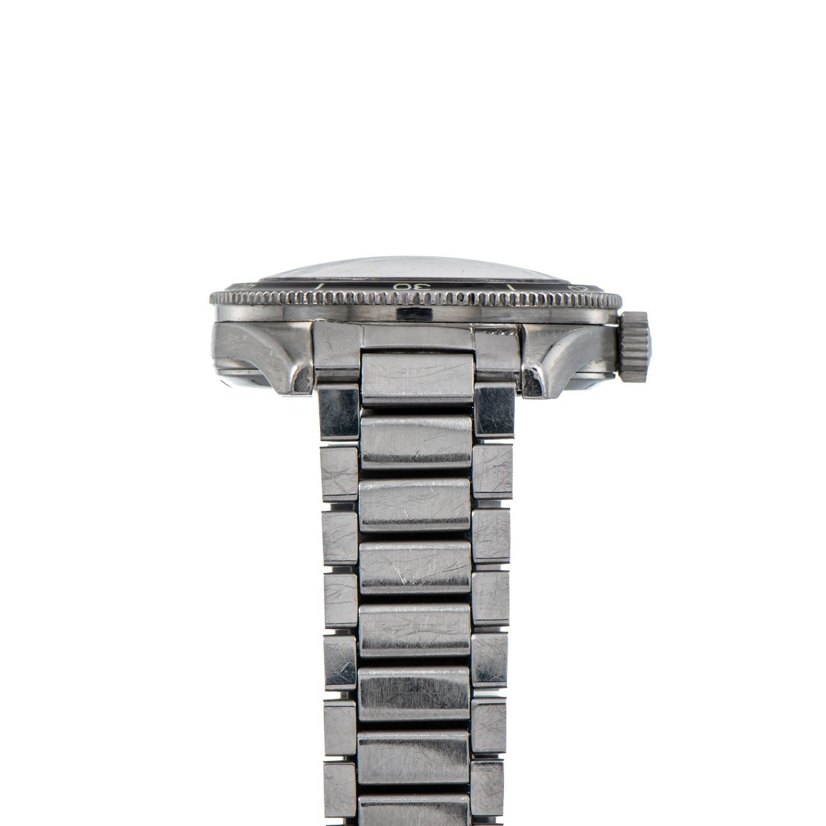 Side view of the OMEGA Seamaster 300, a silver metal wristwatch with a link band and visible crown, shown against a white background.